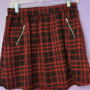 Red and black checkered skirt
